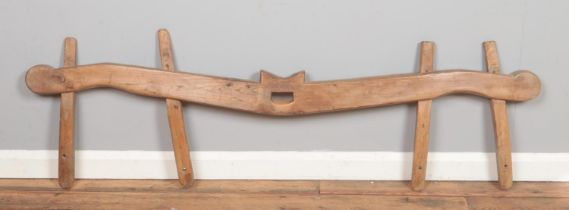 A vintage wooden yoke. Length 163cm.