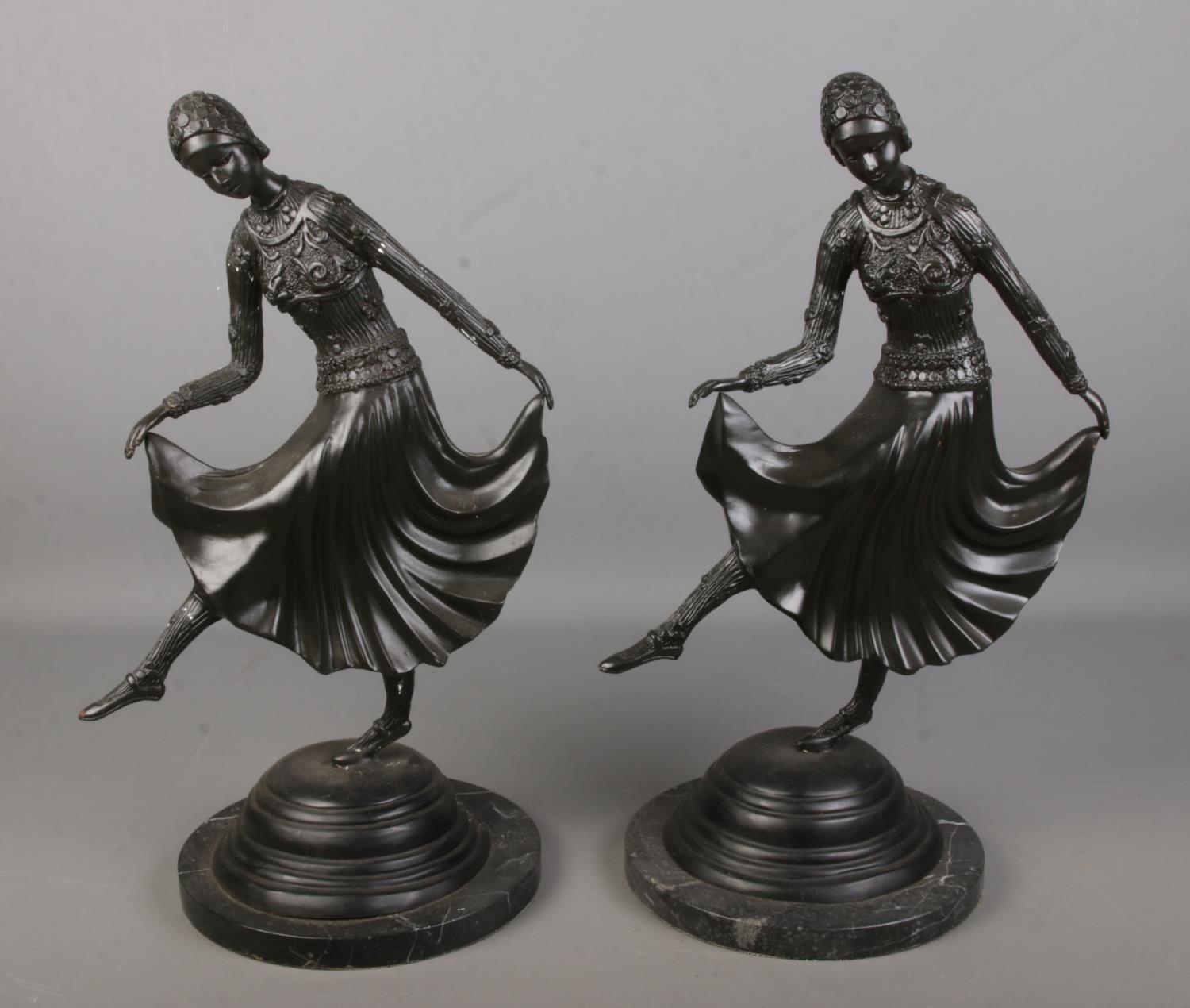 After Joe Descomps, a pair of Art Deco style bronze figures of the "Russian Dancer" mounted on