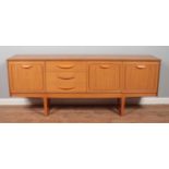 A mid-twentieth century teak sideboard, produced by Stonehill, in the Stateroom design. Height: