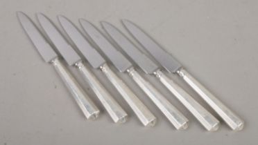 A set of six silver handled fruit knives, with stainless steel blades. The handles assayed for