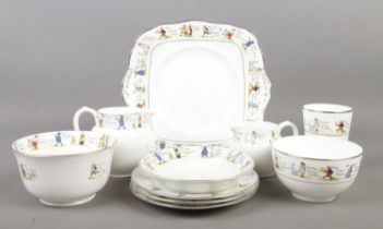 A Paragon part tea service including milk and cream jugs, sugar bowl, side plates etc