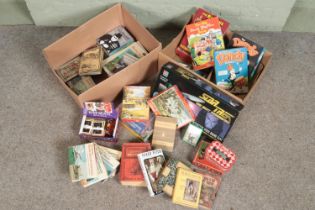 A collection of vintage games, books and other collectables including vintage puzzles, dominoes,