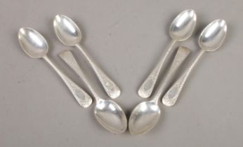 A set of six silver teaspoons, with blank cartouche to the handles. Assayed for London, 1915 by