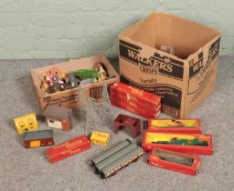 Two boxes of OO gauge model railway track, carriages and accessories to include boxed Tri-Ang