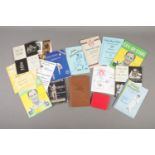 A collection of cricket ephemera including autograph book, signed programme for England V India