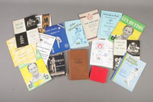 A collection of cricket ephemera including autograph book, signed programme for England V India