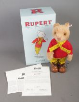 A boxed limited edition Steiff Rupert Bear 653599 with certificate of authenticity. No. 277/1973.