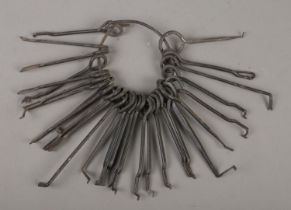 A set of antique iron lock picking keys.