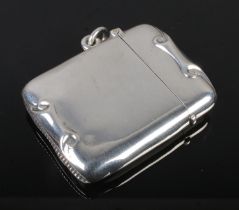 A silver vesta case with scrolling design assayed Birmingham 1896 Henry Matthews, 28.8g