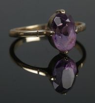 A 9ct Gold ring set with large faceted amethyst stone. Size NÂ½. Total weight: 2.1g