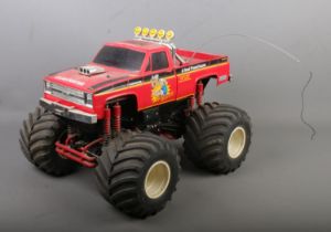 A Tamiya 'Clod Buster' remote controlled monster truck. No remote. Not working.