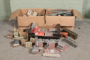 Three large boxes of railway diorama accessories including a large quantity of buildings, miniatures