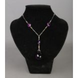 An art deco Platinon necklace, set with small simulated pearls and amethyst coloured stones.