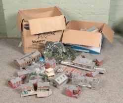 Two large boxes of railway diorama accessories mostly of buildings including, platform buildings,