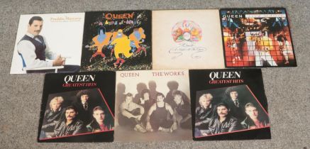 Queen; A collection of seven LP vinyl records, including A Night at the Opera, A Kind of Magic,