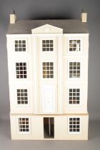 A large three storey fitted doll house complete with electronic wiring and good selection of