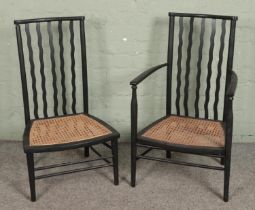 Two liberty style wavy back chairs with bergere seats, one elbow armchair and one other example.