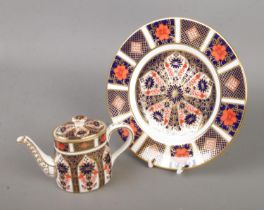 Two pieces of Royal Crown Derby Imari ceramics in the 1128 pattern to include miniature tea pot (