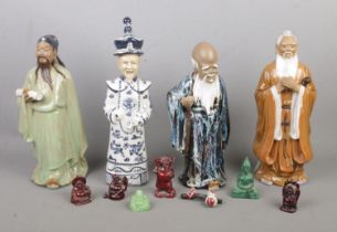 A collection of oriental figures, including miniature, resin and Chinese Shiwan examples. Damage