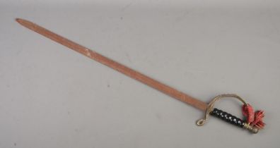 A vintage dress sword, with brass cross guard. Blade length: 81cm. CANNOT POST OVERSEAS.