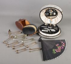 A quantity of collectables. Includes musical cased manicure set, hand fan, brush set and ten pairs