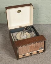 A 1950's original oak cased Dansette record player