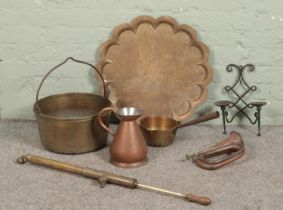 A quantity of metalwares, including jam pan, copper bugle, copper half gallon jug and brass watering