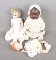 Two Armand Marseille bisque head porcelain dolls stamped A.M Â½ DEP and 351./4.K along with