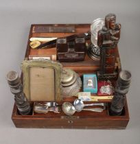 A mahogany writing box containing an assortment of collectables, to include boxed Kindal & Dent