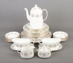 A Minton Spring Bouquet tea/dinner service, includes teapot, milk jug, gravy boat, dinner plates