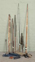 A quantity of vintage fishing equipment, including intrepid reels, cane stake, fly case and cane