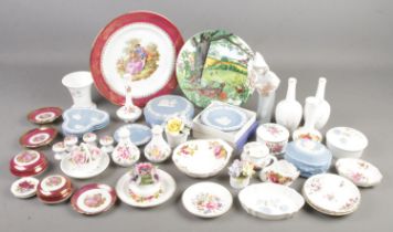 A collection of ceramics. Includes Wedgwood Jasperware, Limoges, Royal Crown Derby, Lladro figure,