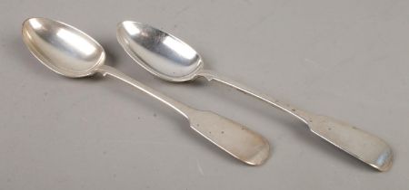 A pair of Victorian silver fiddle pattern basting spoons. Assayed for Exeter, 1854 by Josiah