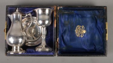 A silver communion set assayed Birmingham 1875 Hilliard & Thomason, 124.2g