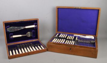 Two cased canteens of cutlery, to include complete fish set bearing silver collars and near complete