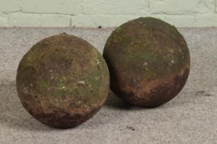 A pair of reconstituted stone garden balls Hx28cm