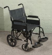 A Lomax folding wheelchair.