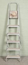 A set of aluminium step ladders