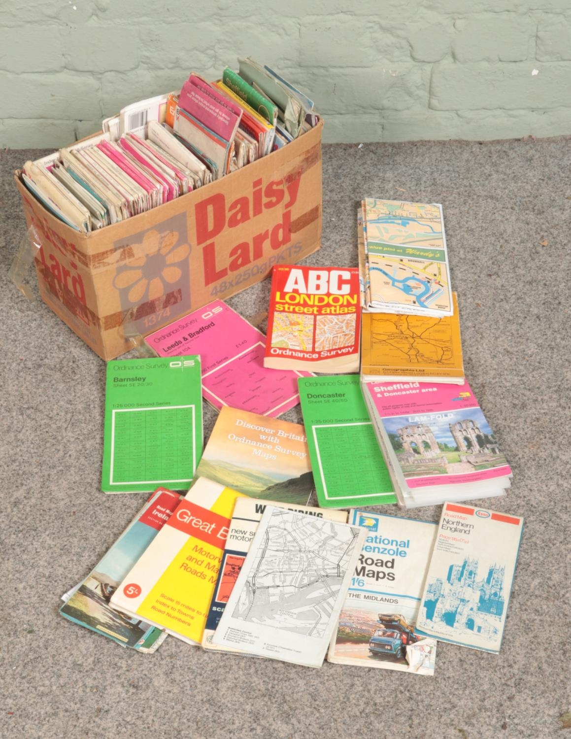 A box of assorted British ordnance survey maps to include Yorkshire, Wales, Three Peaks, etc.