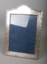 A Carr's of Sheffield Ltd. silver photo frame hallmarked for Sheffield 1992. Approx. photo