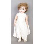 An Armand Marseille bisque head porcelain doll stamped 1894 A.M Â½ DEP to base of neck.