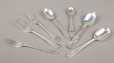 A collection of assorted silver flatware. To include George III fork with 'Joan Gattell' engraved to