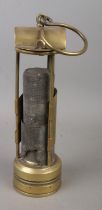 A brass miners Davy lamp, unmarked. Approx. height 24cm.