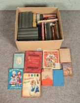 Two boxes of assorted vintage books, including many children's examples. To include a set of eight