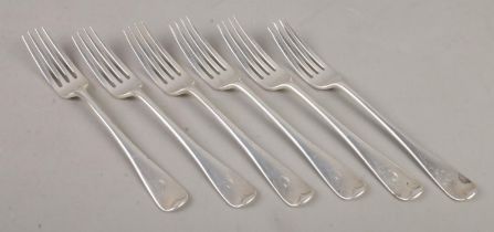 A set of six Edwardian silver table forks, bearing 'C' to the top of the handle. Assayed for London,