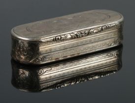 A Victorian silver snuff box of oblong form, with scrolled and engine turned detailing and blank