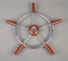 A vintage five-spoke ships wheel. 57cm diameter.