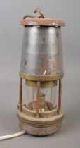 A William Maurice Ltd miners safety lamp, The Wolf, Type FS. Converted to electric.