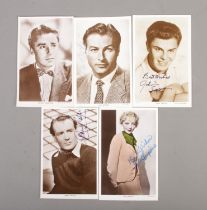 A collection of signed Picturegoer Photographic Postcards to include Peter Lawford, Lex Barker, John