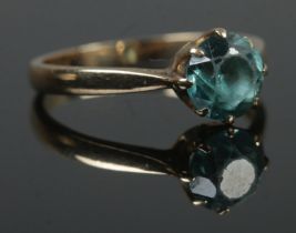 A 9ct Gold solitaire ring, set with large faceted aquamarine stone. Size NÂ½. Total weight: 2.1g